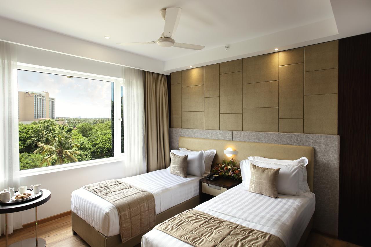 Sugar Business Hotel Kochi Exterior foto